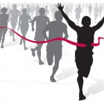 Winning Athlete ahead of a group of marathon runners.